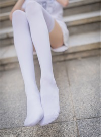 Rabbit plays with painted white stockings over the knee(4)